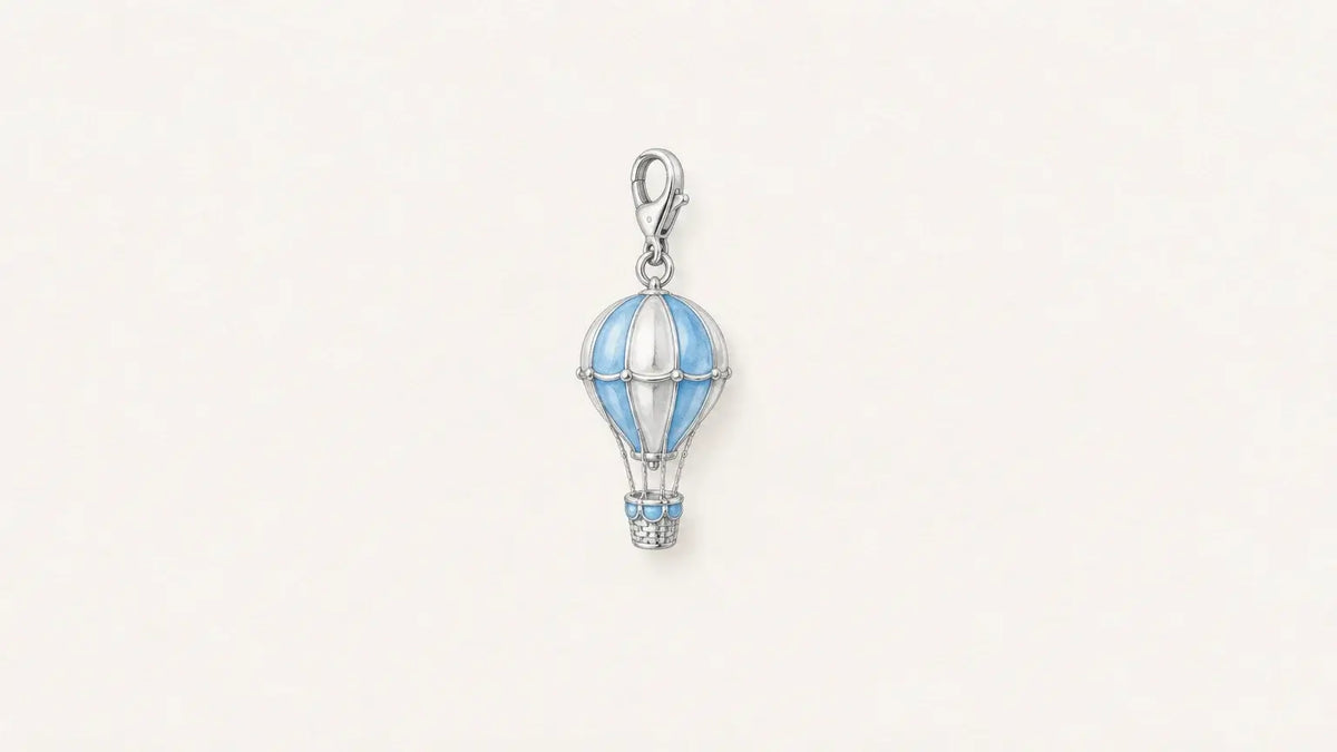 Charm montgolfière aux détails bleus et argentés