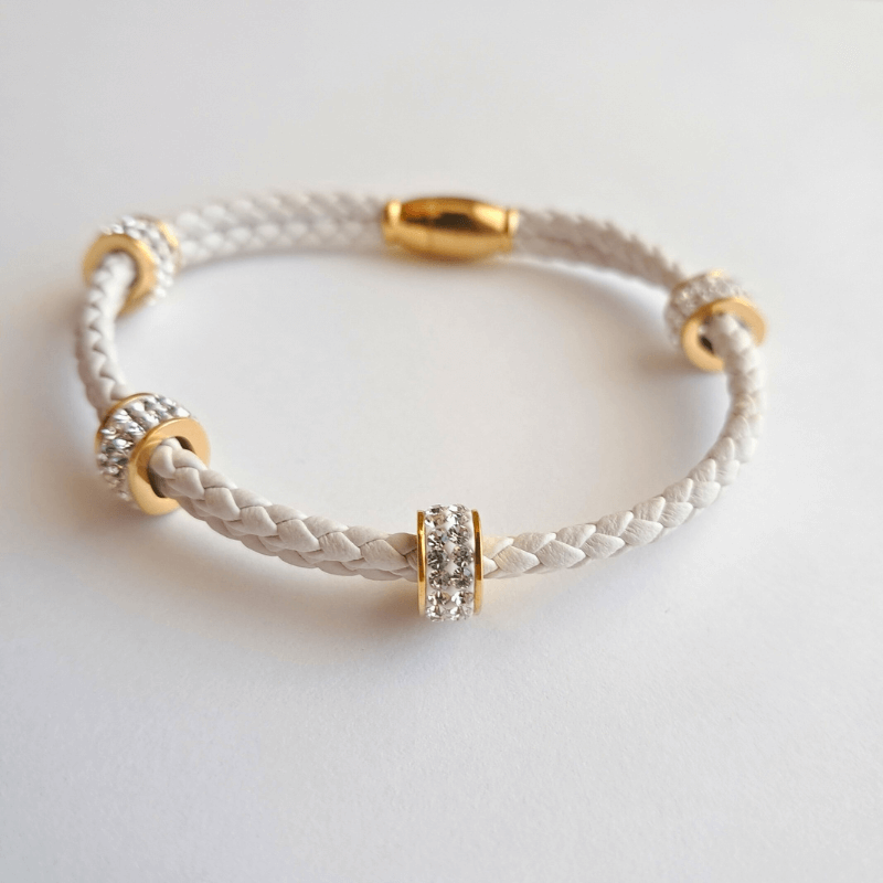 Bracelet cordon femme blanc avec perles dorées et pierres synthétiques