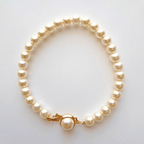 Bracelet perles imitation Majorque blanches 6 mm avec fermoir plaqué or