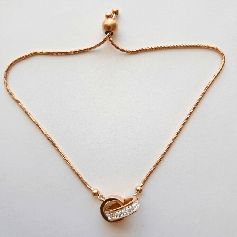 Bracelet réglable femme en acier doré rose