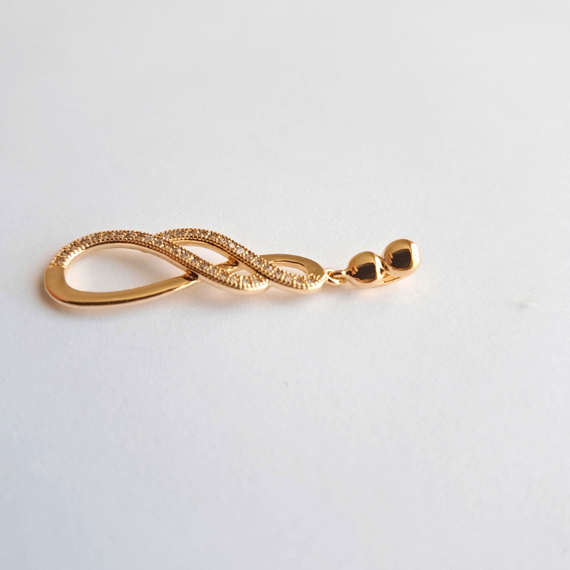 Pendentif infini en plaqué or pour femme orné de zirconium scintillant